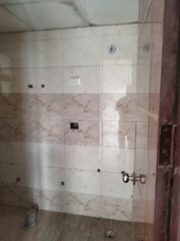 Bathroom in 3 BHK Apartment at Charms Castle Phase II, Raj Nagar Extension – for Sale