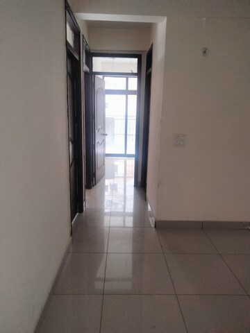 Building Lobby in 3 BHK Apartment at Charms Castle Phase II, Raj Nagar Extension – for Sale