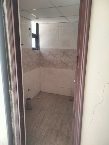 Bathroom in 3 BHK Apartment at Charms Castle Phase II, Raj Nagar Extension – for Sale