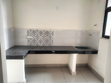 Kitchen in 3 BHK Apartment at Charms Castle Phase II, Raj Nagar Extension – for Sale