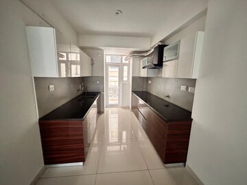 Kitchen in 4 BHK Apartment at Hermitage Centralis, Vip Road – for Sale