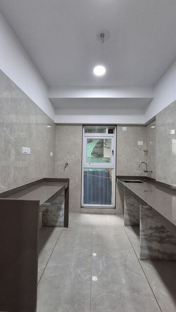Kitchen in 2 BHK Apartment at Apex Green Wood, Borivali East – for Sale