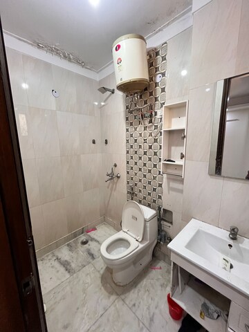 Bathroom in 3 BHK Apartment at Khirki Extension – for Rent