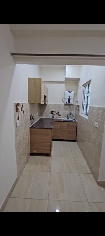 Kitchen in 1 BHK Apartment at Gaur City 2 - 14th Avenue, Sector 16c Greater Noida – for Rent
