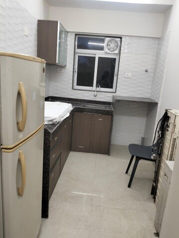 Kitchen in 1.5 BHK Apartment at Chandiwala Pearl Regency, Andheri West – for Rent