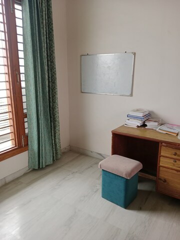 Bedroom in 1.5 BHK Builder Floor at Sector 18 – for Rent