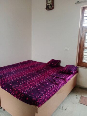 Bedroom in 1.5 BHK Builder Floor at Sector 18 – for Rent