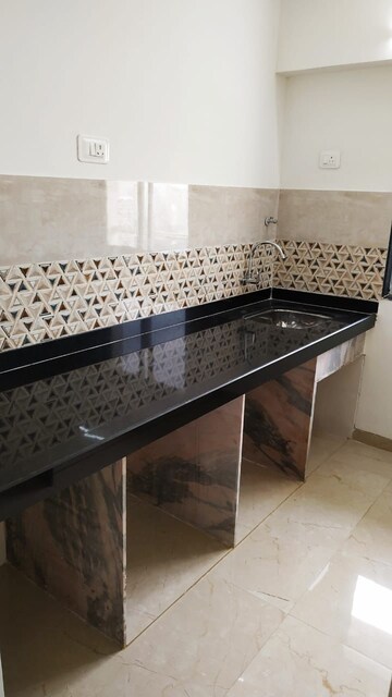 Kitchen in 1 BHK Apartment at Mahavir Square, Manpada – for Rent