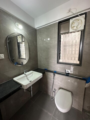 Bathroom in 4 BHK Apartment at Pride World City Wellington, Charholi Budruk – for Sale