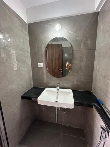 Bathroom in 4 BHK Apartment at Pride World City Wellington, Charholi Budruk – for Sale