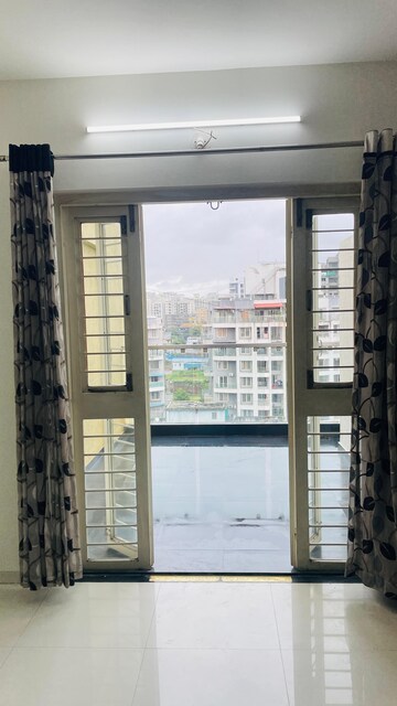 Room in 2 BHK Apartment at Windwards CHS, Wakad – for Rent