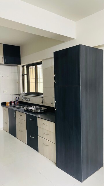 Kitchen in 2 BHK Apartment at Windwards CHS, Wakad – for Rent