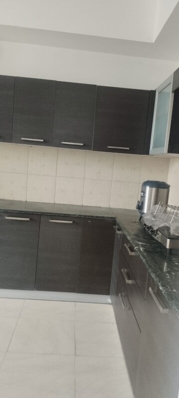 Kitchen in 3 BHK Apartment at Puri Pranayam, Sector 82 – for Rent