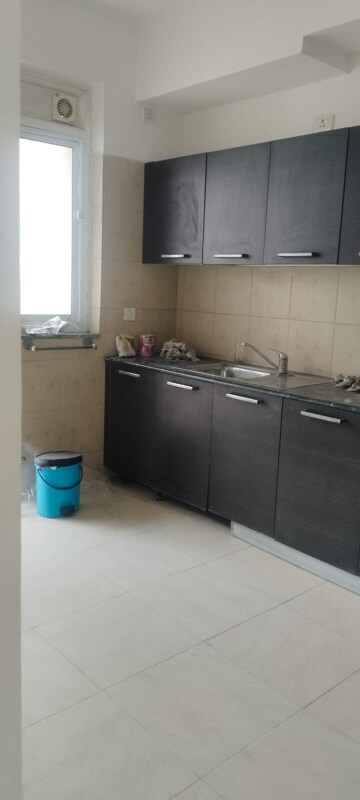 Kitchen in 3 BHK Apartment at Puri Pranayam, Sector 82 – for Rent