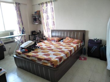 Bedroom in 2 BHK Apartment at Kolte Patil Dew Drops, Vishrantwadi – for Rent