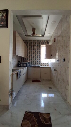 Kitchen in 2 BHK Apartment at SLF Anushree, Sector 75 – for Sale