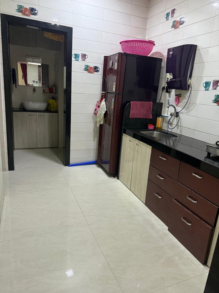 Kitchen, dhan-durga 2 Bedroom 725 Sq.Ft. Apartment In Uthalsar Thane 9046291