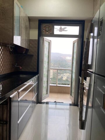Kitchen in 2 BHK Apartment at Omkar Alta Monte, Malad East – for Sale