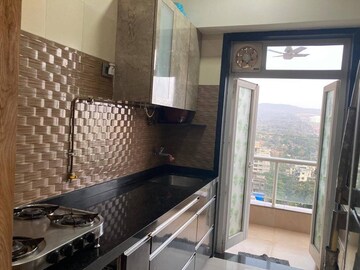 Kitchen in 2 BHK Apartment at Omkar Alta Monte, Malad East – for Sale