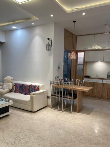 Living Room in 2 BHK Apartment at Omkar Alta Monte, Malad East – for Sale