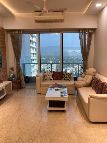 Living Room in 2 BHK Apartment at Omkar Alta Monte, Malad East – for Sale