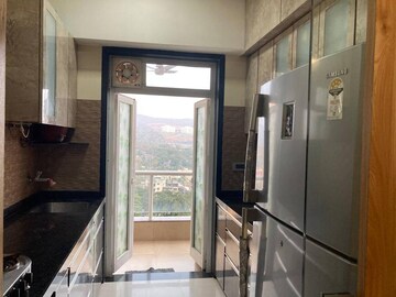 Kitchen in 2 BHK Apartment at Omkar Alta Monte, Malad East – for Sale