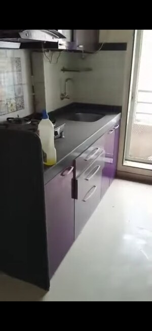 Kitchen in 1 BHK Apartment at Mahavir Kalpavruksha, Ghodbunder Road – for Sale