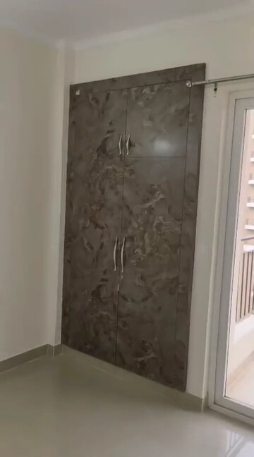 Building Lobby in 3 BHK Apartment at Amrapali Crystal Homes, Sector 76 – for Rent