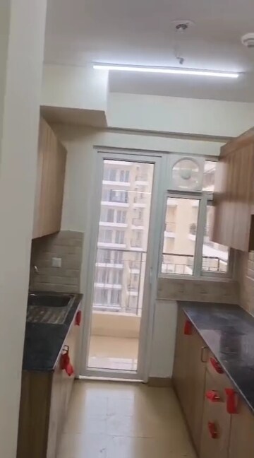 Kitchen in 3 BHK Apartment at Amrapali Crystal Homes, Sector 76 – for Rent