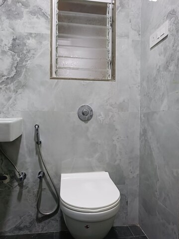 Bathroom in 1 BHK Apartment at Kanak Heights Geeta Bhavan CHS, Malad East – for Rent