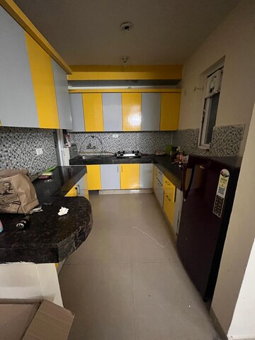 Kitchen in 3 BHK Apartment at Sunworld Arista, Sector 168 – for Rent