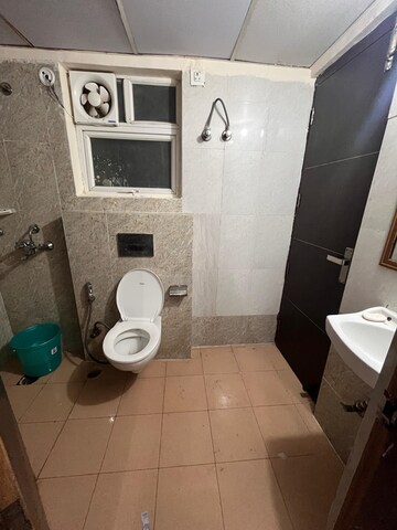 Bathroom in 3 BHK Apartment at Sunworld Arista, Sector 168 – for Rent
