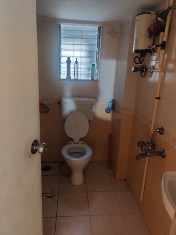 Bathroom in 1 BHK Apartment at Kingston Heights, Malad West – for Rent