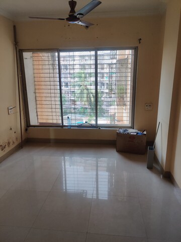 Room in 1 BHK Apartment at Kingston Heights, Malad West – for Rent
