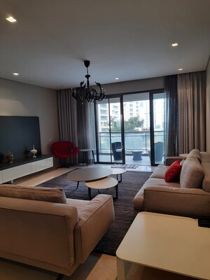 Living Room in 5 BHK Apartment at Panchshil One North, Magarpatta City – for Sale