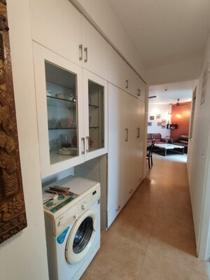 Kitchen in 3.5 BHK Penthouse at Unitech Palms, South City 1 – for Sale