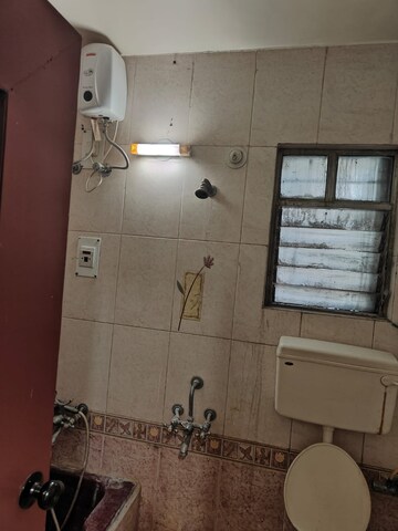 Bathroom in 2 BHK Apartment at Raviraj Planet Millenium, Pimple Saudagar – for Sale