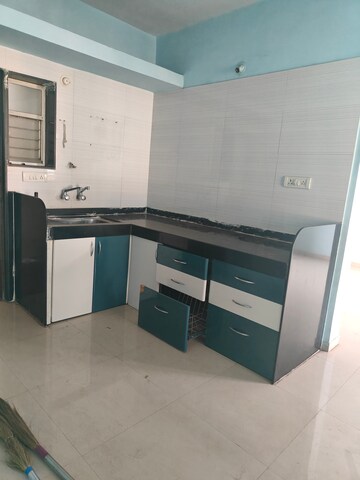 Kitchen in 1.5 BHK Apartment at B. U. Bhandari  Planet Millenium, Pimple Saudagar – for Sale