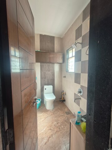 Bathroom in 3 BHK Apartment at Dwarka Lords, Pimple Saudagar – for Rent