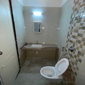 Bathroom in 2 BHK Apartment at Shree Tirupati Maple Tower, Kondhwa – for Rent