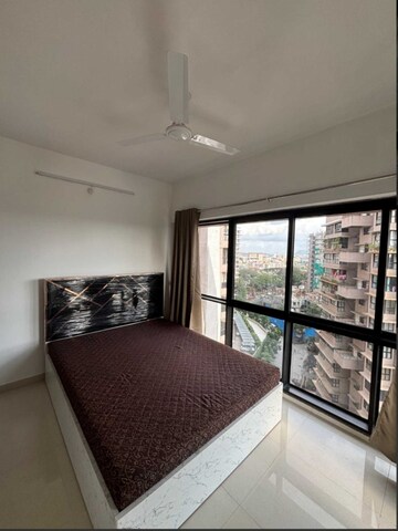 Bedroom in 2 BHK Apartment at Kanakia Rainforest, Andheri East – for Rent