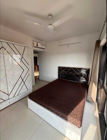 Bedroom in 2 BHK Apartment at Kanakia Rainforest, Andheri East – for Rent