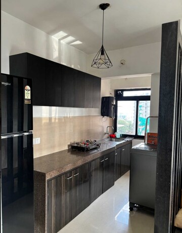 Kitchen in 2 BHK Apartment at Kanakia Rainforest, Andheri East – for Rent