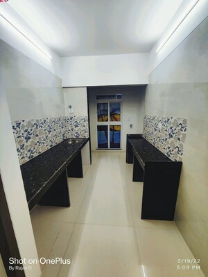 Building Lobby in 1 BHK Apartment at Empire Homes, Ambernath – for Rent