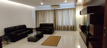 Living Room in 4 BHK Apartment at Brigade Rhapsody, Palace Road – for Rent