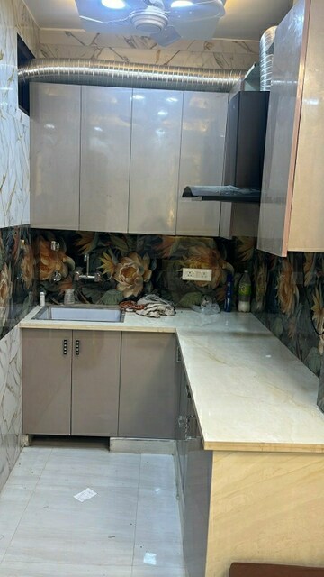 Kitchen in 2.5 BHK Builder Floor at Mansarover Garden – for Rent