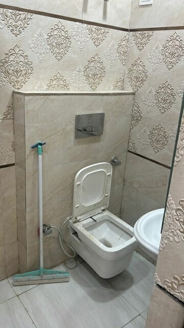 Bathroom in 2.5 BHK Builder Floor at Mansarover Garden – for Rent