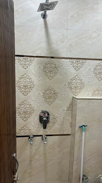 Bathroom in 2.5 BHK Builder Floor at Mansarover Garden – for Rent