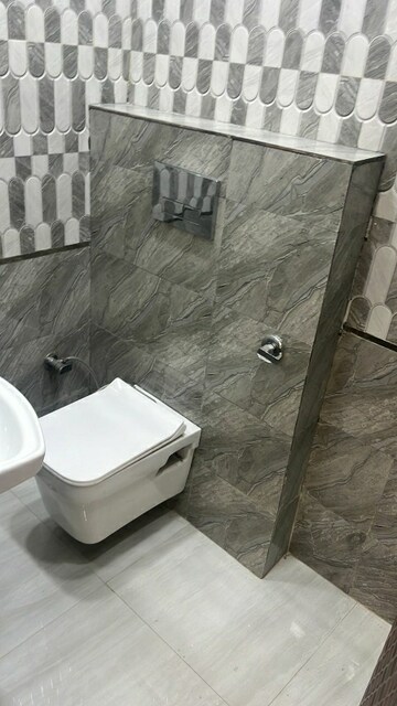 Bathroom in 2.5 BHK Builder Floor at Mansarover Garden – for Rent