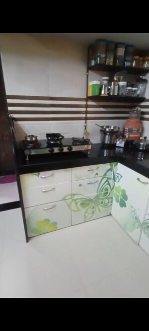 Kitchen in 1 BHK Apartment at Krishna Nagari Niwara CHS, Goregaon East – for Sale